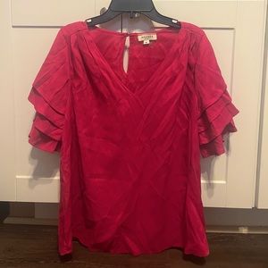 Pink top with ruffle sleeves